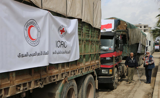 Syria regime strikes Eastern Ghouta as aid trucks wait