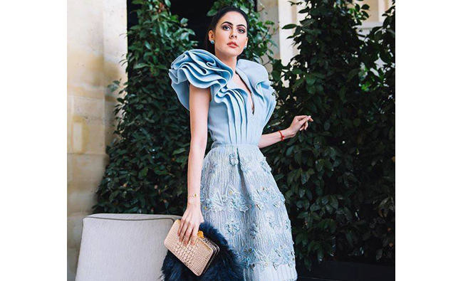 Arab fashion icon Tamara Al-Gabbani wants to inspire people to be happy