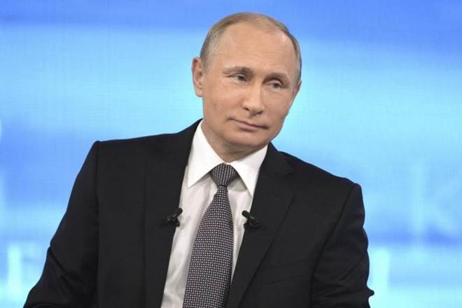 Exit polls suggest Vladimir Putin easily wins re-election
