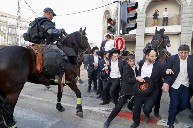 Israeli police arrest ultra-Orthodox Jews in draft protest