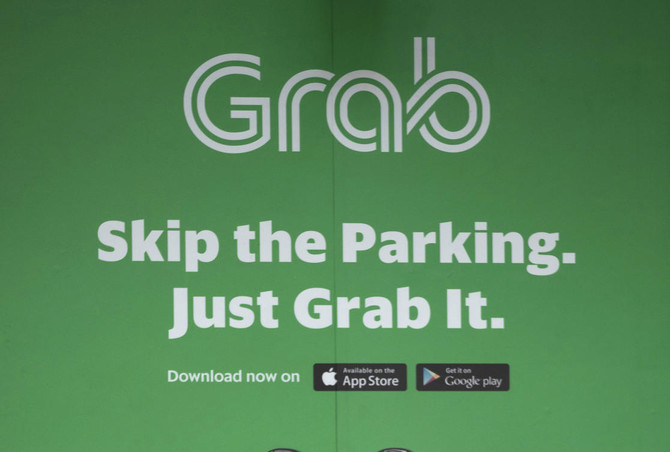 Malaysia puts Grab on anti-competition watchlist after Uber stake buy
