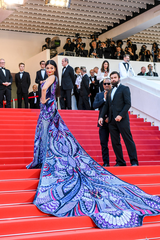 TIMES NOW - The style queen Aishwarya Rai has arrived on the Cannes red  carpet and we cannot keep calm. The actress looks stunning clad in a  flowery embellished black gown. Take