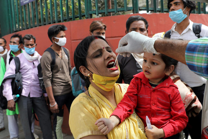 India coronavirus cases surge to four-month high, some lockdowns return | Arab News