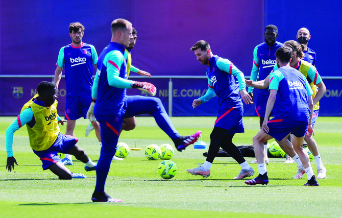 Barcelona’s Lionel Messi and teammates during training ahead of their crucial La Liga match against frontrunners Atletico Madrid on Saturday. Reuters