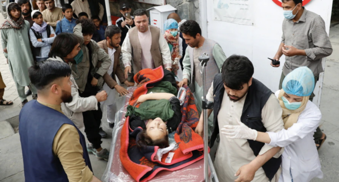 An injured woman is transported to a hospital after a blast in Kabul, Afghanistan, May 8, 2021. (Reuters)