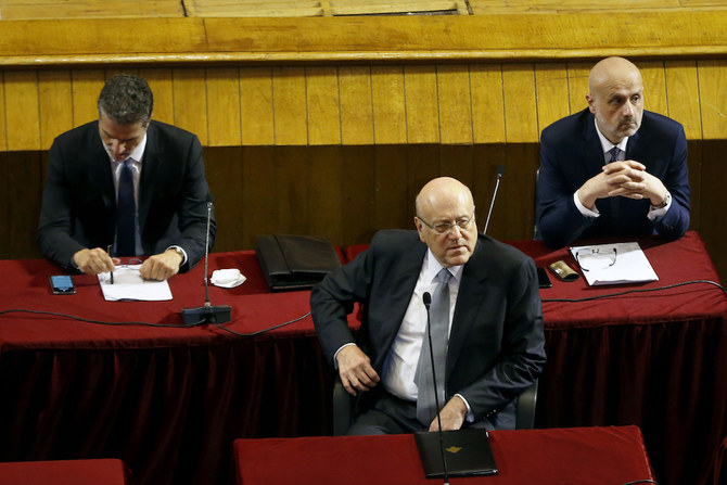 Lebanese Prime Minister Najib Mikati (C) attends a parliament session to confirm the new government at a Beirut theater known as the UNESCO palace, Sept. 20, 2021. (AP)