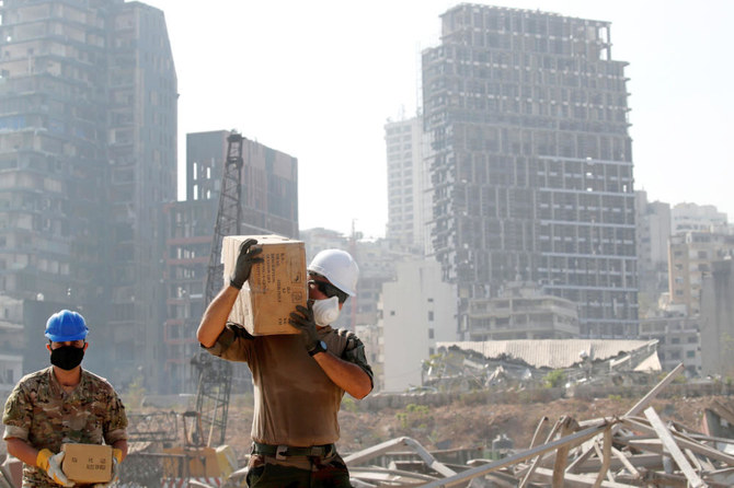 A member of the French military works at the damaged site of the massive August 4, blast in Beirut's port area, in Beirut on August 31, 2020. (AFP)