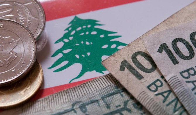 Lebanese caught between old and new $100 banknotes