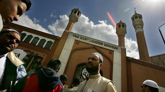 Muslim worshippers gather for Friday prayer on the streets outside the mosque of the Muslim centre in east London. (AFP/File Photo)