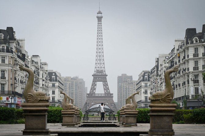 Eiffel Tower' lights up quiet suburb in Chinese city of Asiad host Hangzhou
