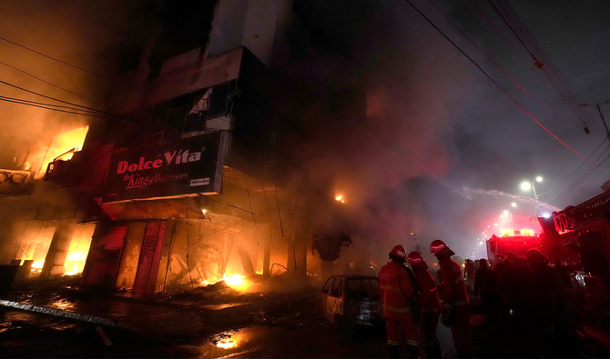 At least 6 dead, 10 hurt after fire at 'illegal' candle