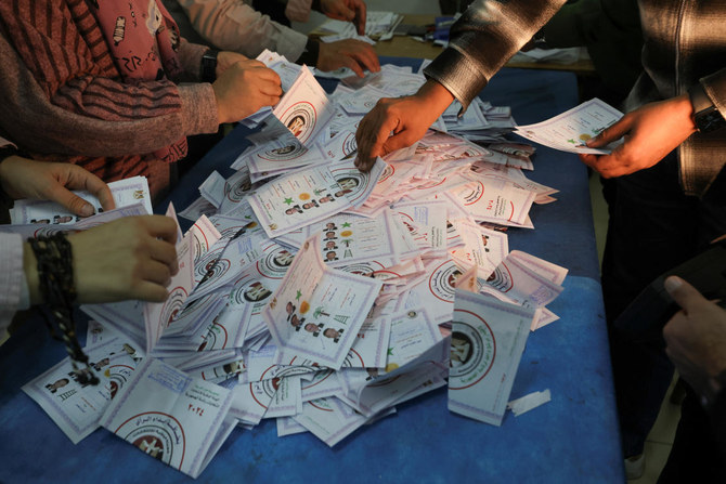 Election officials count ballots inside a school used as a polling station and a counting centre, during the presidential election in Cairo, Egypt, December 12, 2023. (Reuters) Egypt’s El-Sisi cruises toward victory as vote count begins