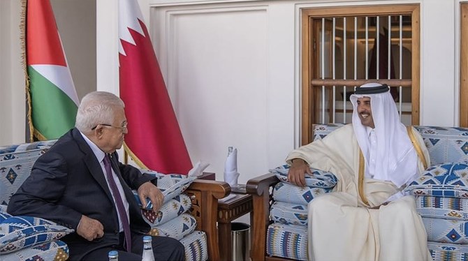 Palestinian President Mahmoud Abbas and Qatar’s emir, Sheikh Tamim bin Hamad Al-Thani in Doha. (QNA)  Palestinian president discusses latest Gaza developments with Qatari emir in Doha