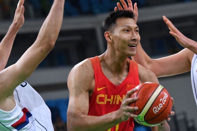 Chinese basketball player Yi Jianlian takes part in a training
