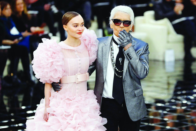 Paris Fashion sparkles in Chanel's hall of mirrors