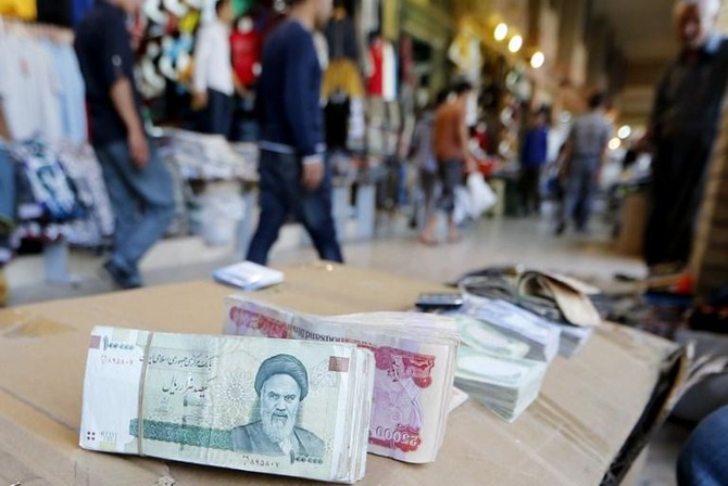 Iran fixes forex rate in bid to stop rial collapse