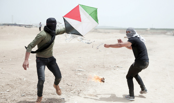 Israeli gunfire in new Gaza border protest kills 4 Palestinians