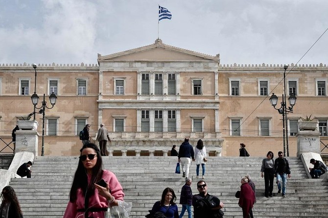 Greece beats its budget target for 3rd year, debt edges down