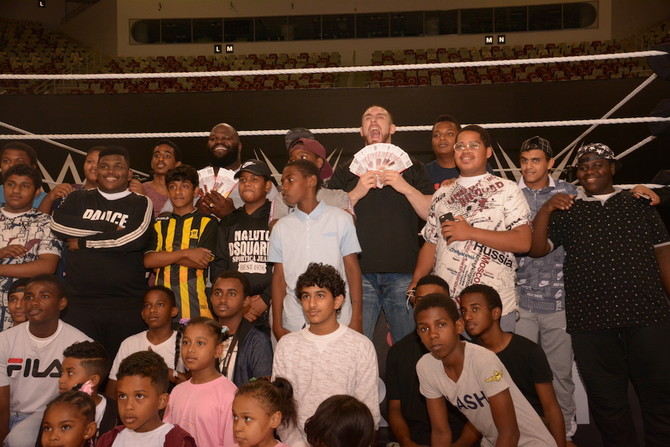 WWE stars soften up to Jeddah children to introduce anti-bullying campaign