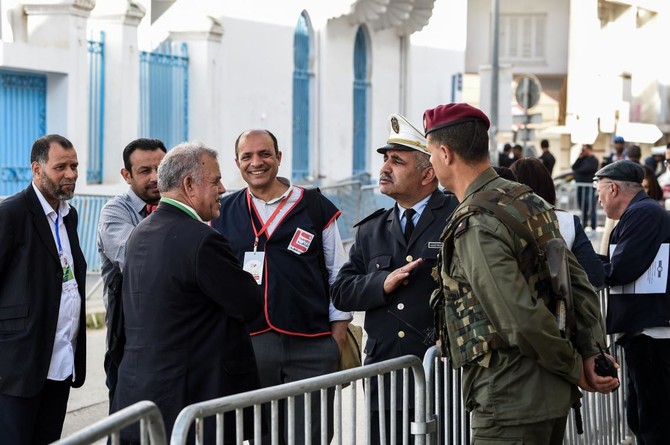 In first for Tunisia, police and soldiers head to polls | Arab News