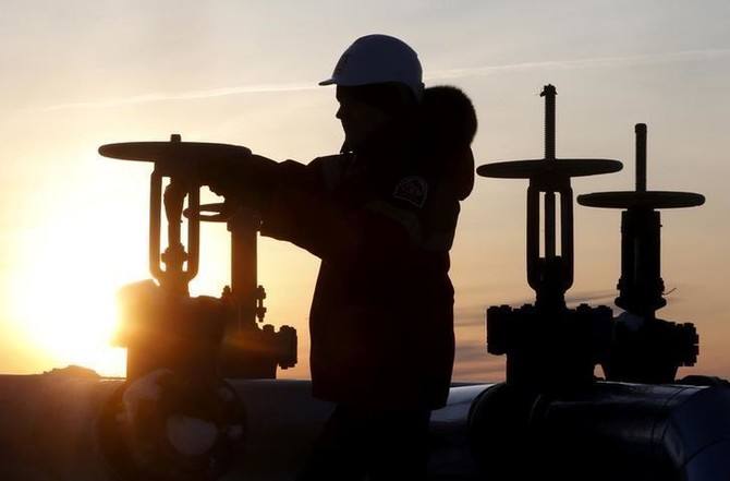 Oil prices fall on rising US crude inventories and record production