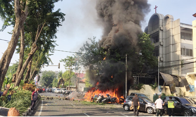 Two families staged Indonesian suicide bombings, say police 