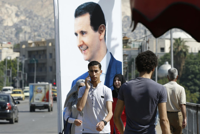Syria’s Assad says will visit North Korea, news agency reports