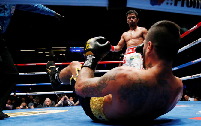Pacquiao stops Matthysse to win back world title 