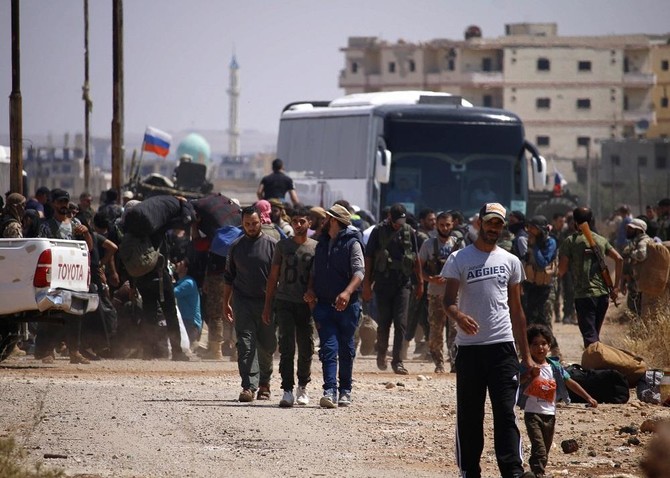 Syria rebels begin leaving zone near Golan: state media