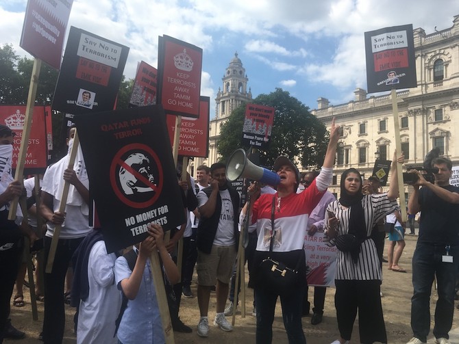 Protesters demonstrate outside UK Parliament over visit of Qatari emir