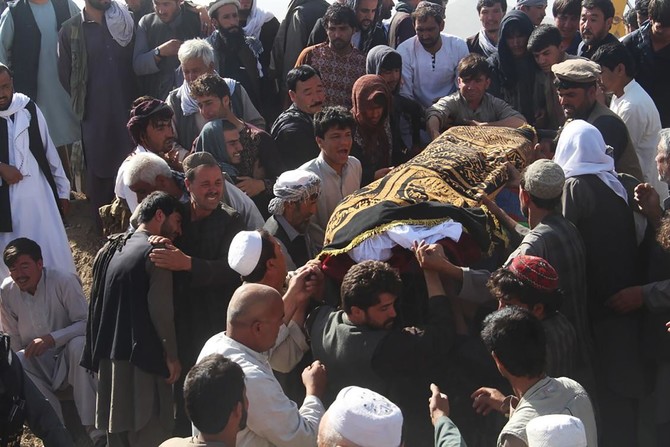 Afghans bury victims of mosque attack as toll rises to 35
