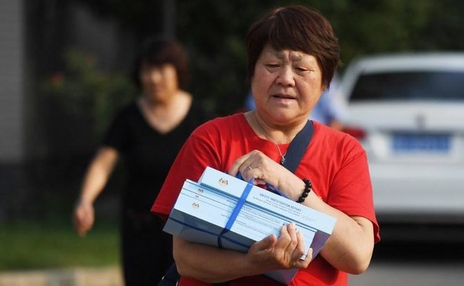 Chinese MH370 relatives ask to meet Malaysia PM