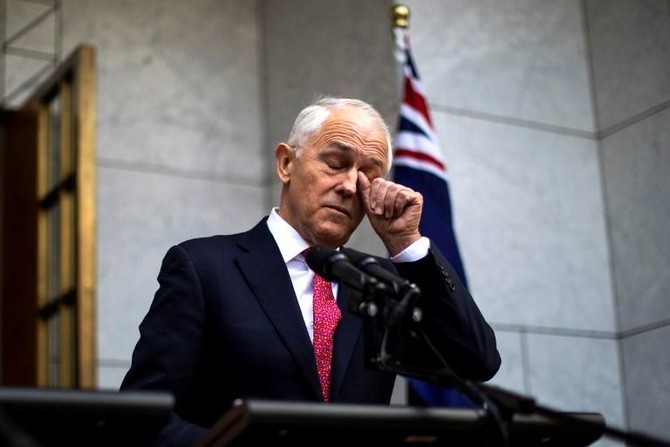 Bruised Australian prime minister survives leadership challenge, for now