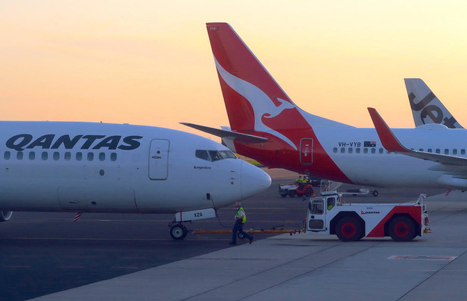 Qantas posts record profit, but shares hit by fuel cost worries