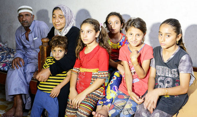 Iraqi grandmother faces daily battle caring for 22 children
