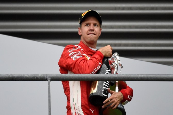Sebastian Vettel eats into Lewis Hamilton’s championship lead with great win at Belgian Grand Prix