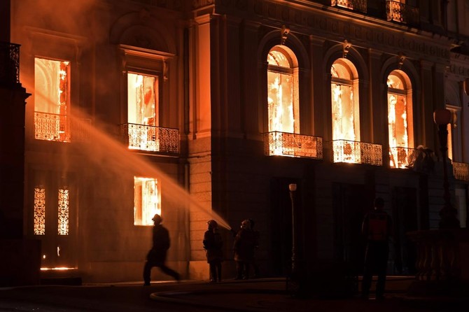 Firefighters try to save relics as fire engulfs Rio museum