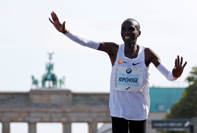 Kenya’s Eliud Kipchoge breaks marathon world record in Berlin