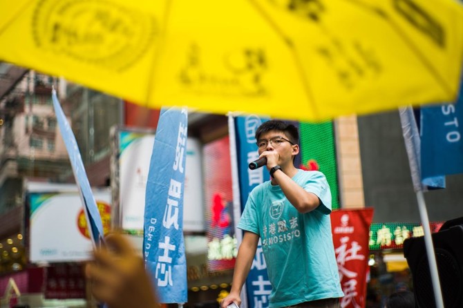 Thousands protest in Hong Kong over China suppression