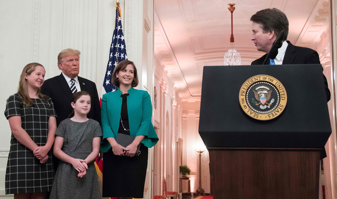 Kavanaugh seeks new tone after Supreme Court fight; Trump apologizes for process