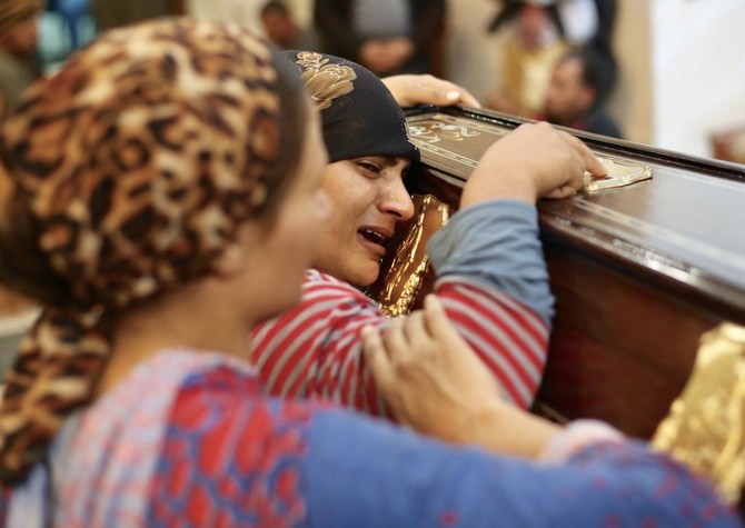 Christians in Egypt prepare to bury dead a day after attack