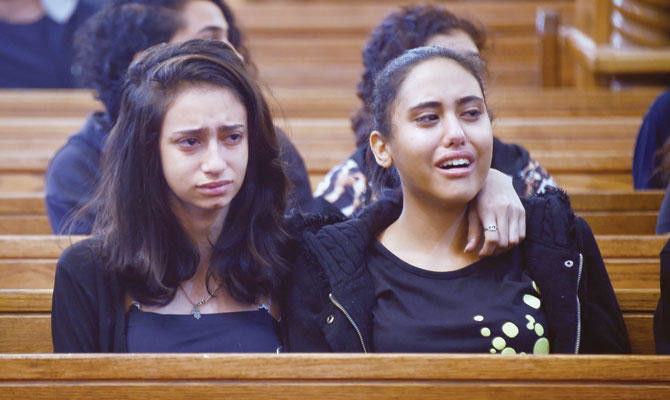 Angry Copts mourn Egypt bus attack victims