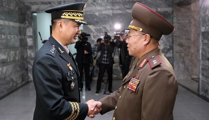 Seoul says 2 Koreas complete disarming 22 guard posts