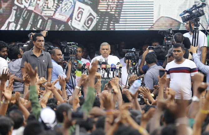Punch-up in Sri Lankan parliament as thousands rally