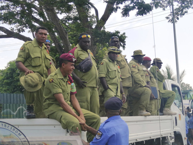 Papua New Guinea police, soldiers storm parliament over unpaid APEC bonuses