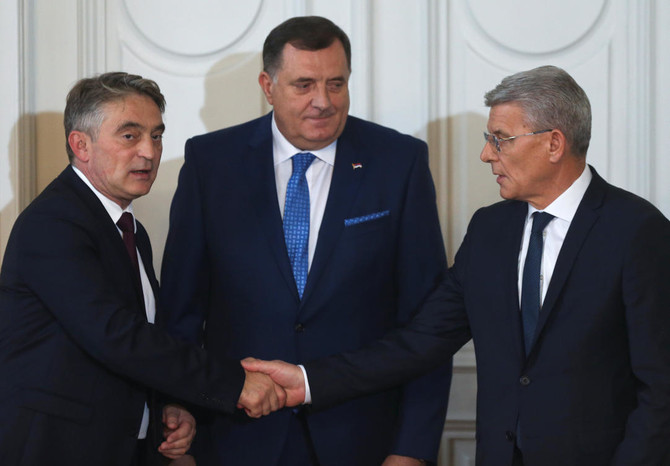 Bosnia swears in a three-man presidency dominated by nationalists