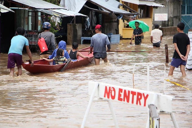 56 dead from landslides, floods in Philippines 