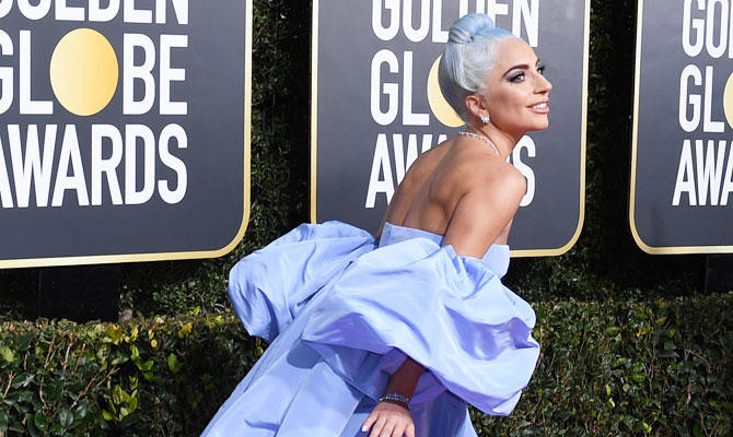 Lady Gaga, ‘Roma’ shine at nice over nasty Golden Globes