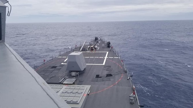 US navy ship sails in disputed South China Sea amid trade talks with Beijing