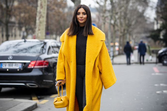 Lebanese blogger Nathalie Fanj braves the snow for her fashion fix in Paris